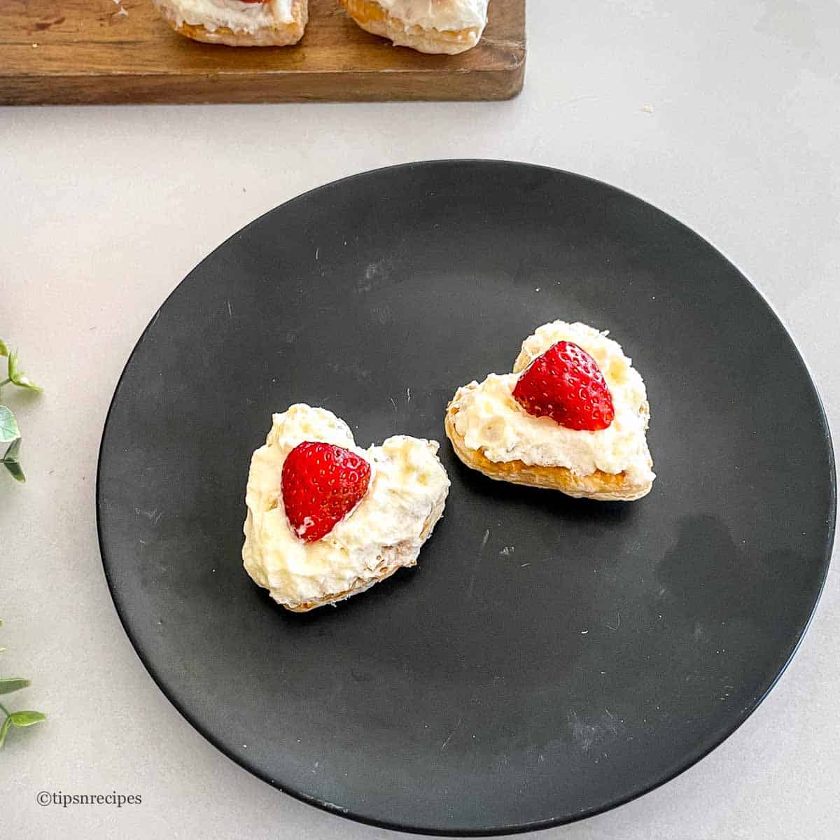 heart pastry puffs on a plate.