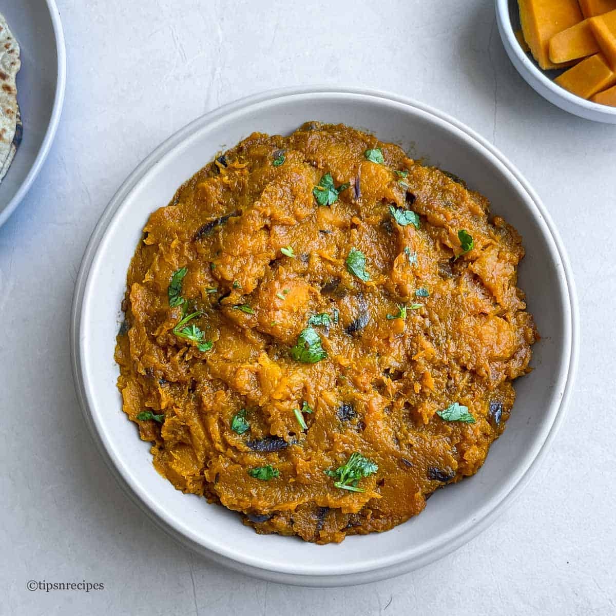 A bowl of Indian styled cooked pumpkin vegetable.