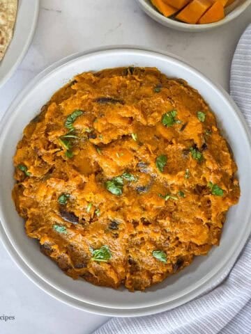 Mashed Pumkin Indian Kaddu sabzi in a bowl.
