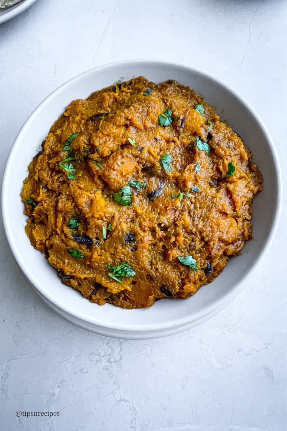A bowl of mashed pumkin (kadddu sabzi).
