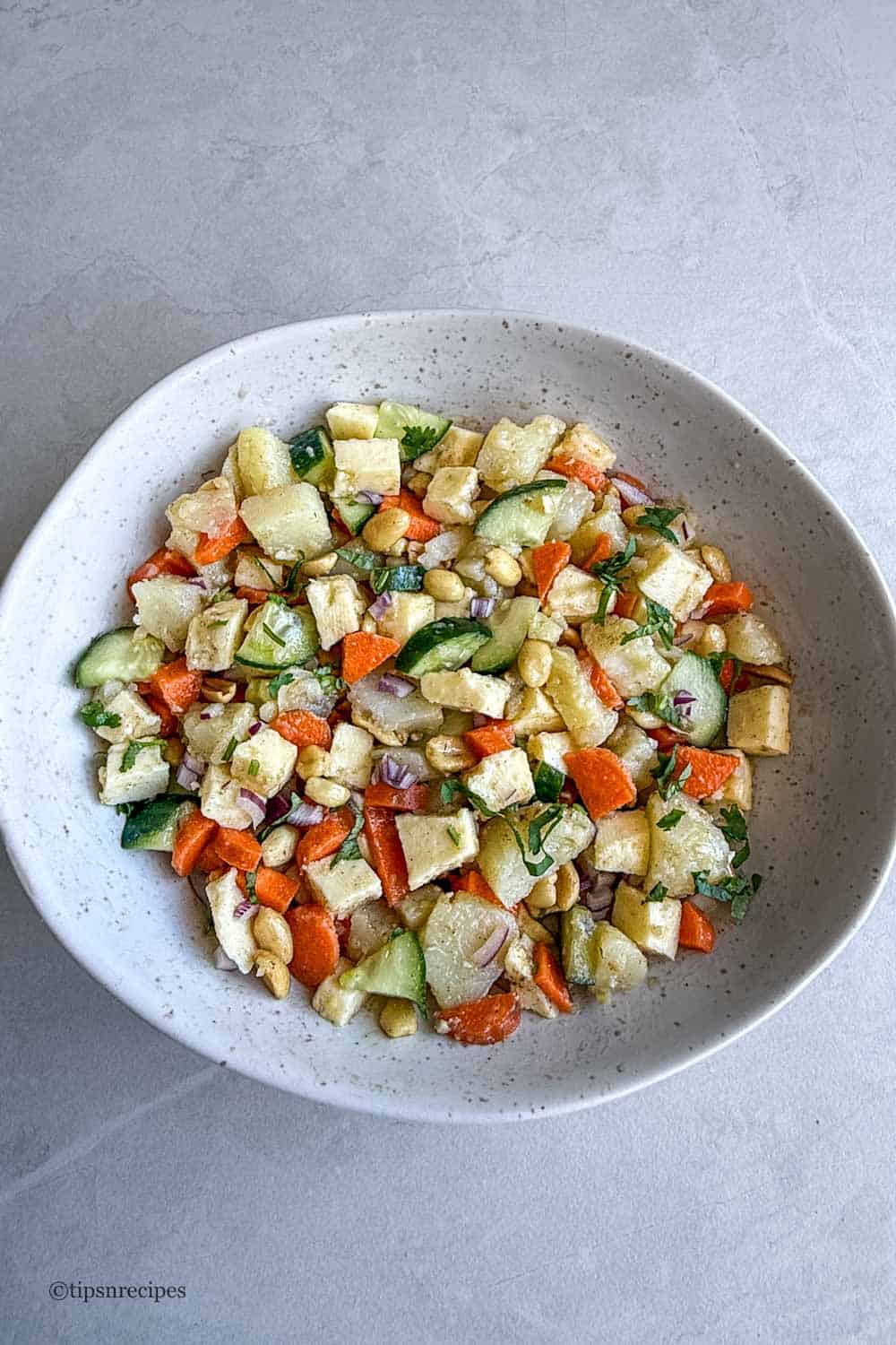 A bowl of Indian cottage cheese and potato salad.