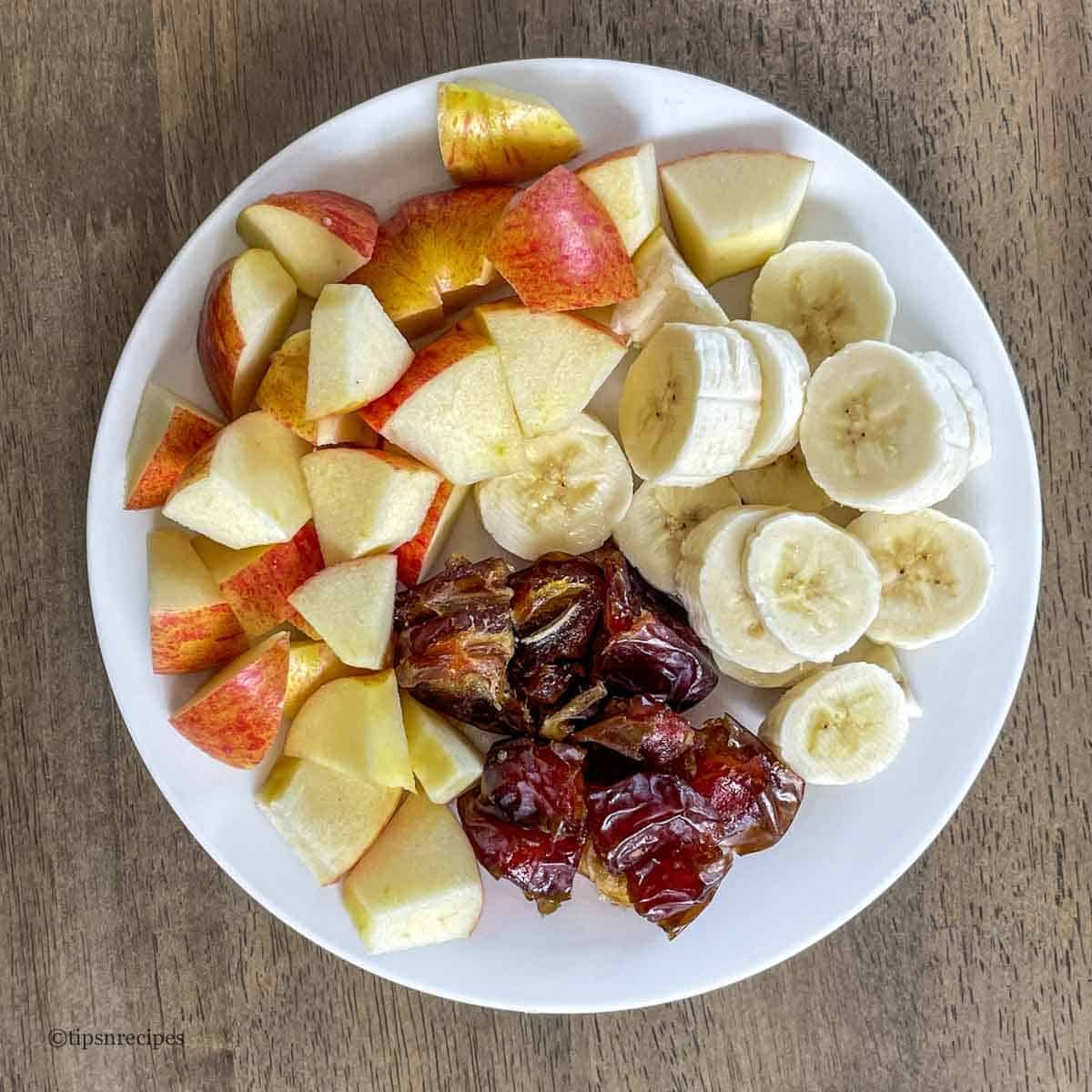 Chopped banana apple and dates for breakfast smoothie.
