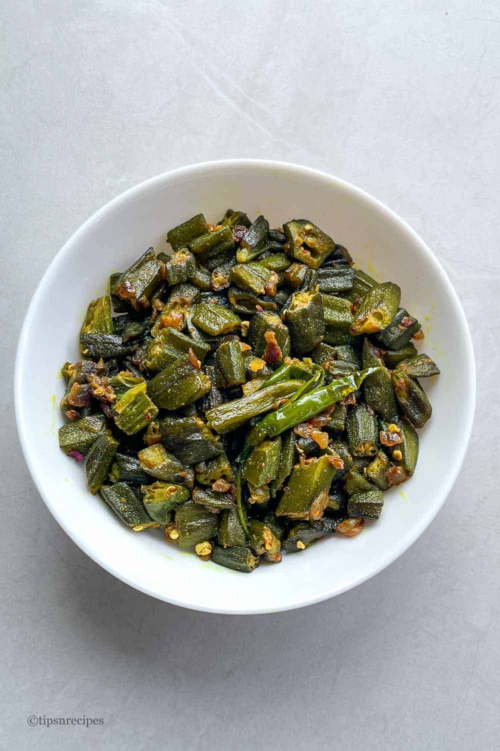 Pan fried frozen okra in a bowl.