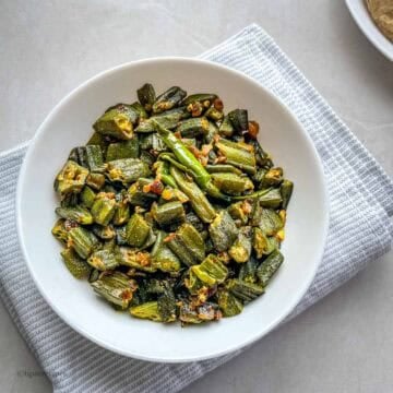 A bowl of frozen okra cooked in Indian style .