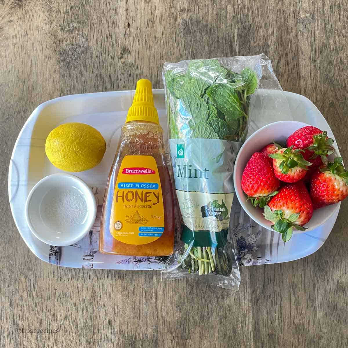 Ingredients for strawberry mint drink.