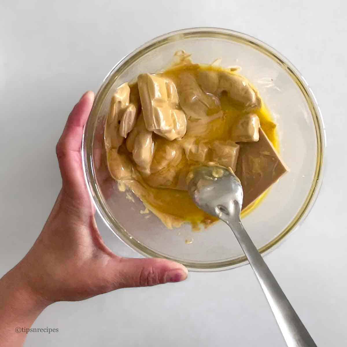 Melting of white chocolate in a microwave safe bowl.