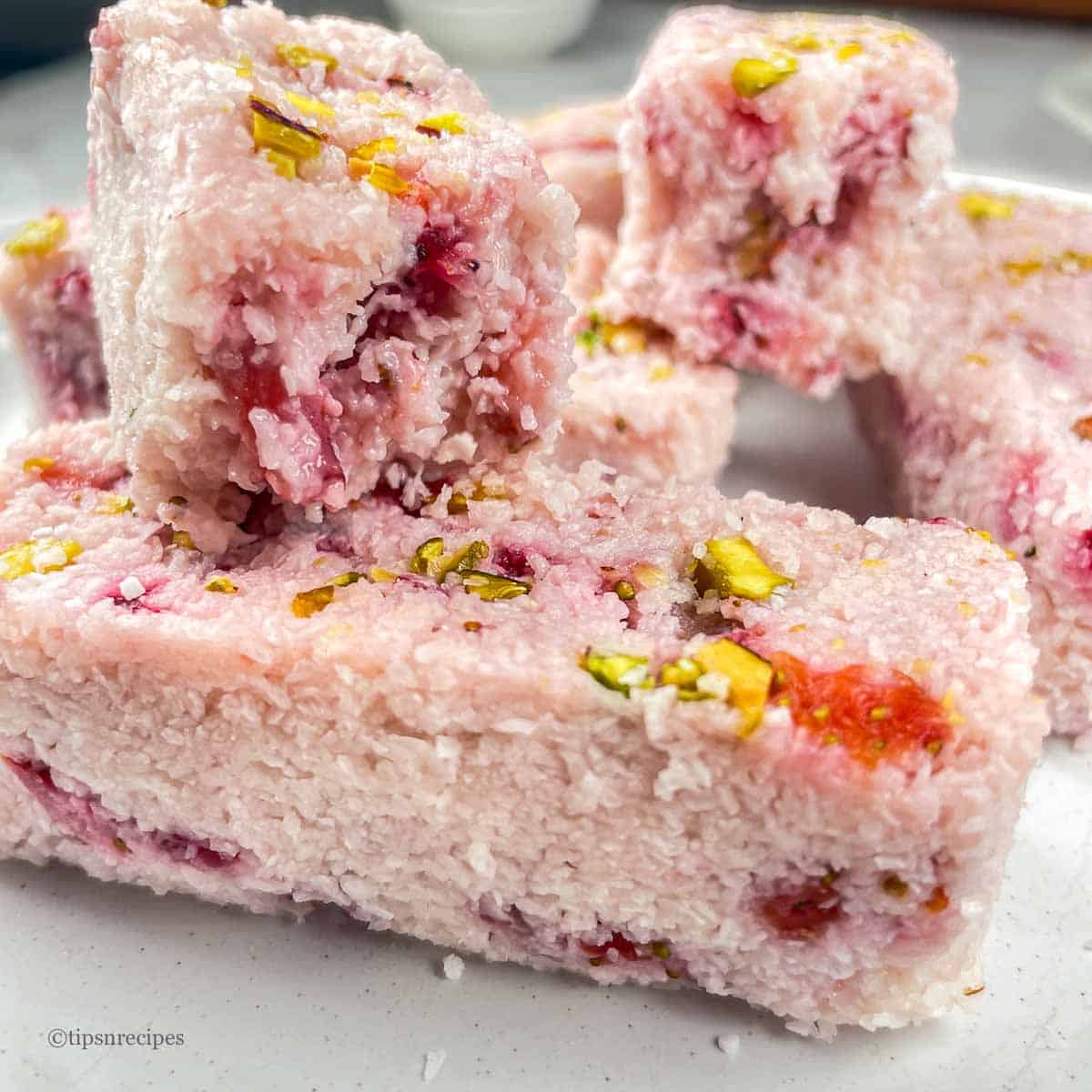 Coconut strawberry bars after a bite.