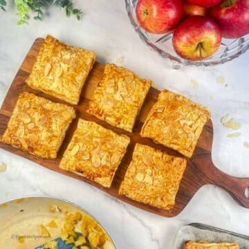 Frshly air fryer baked apple pie with puff pastry on wooden