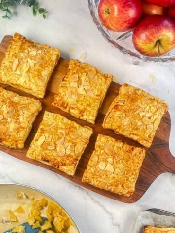 Frshly air fryer baked apple pie with puff pastry on wooden