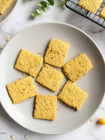 Air fryer chickpea and oat crackers served on a plate.