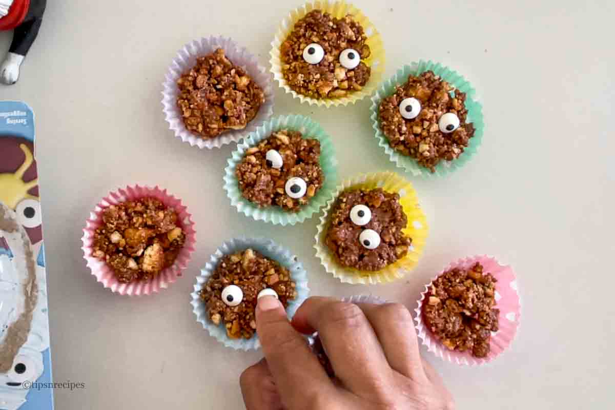 Placing eye balls to cookie monsters.