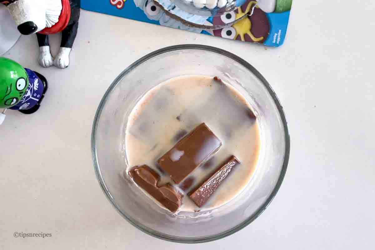 Melting of chocolate along with milk in a bowl.